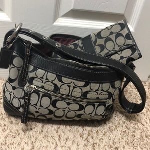 My first Coach bag. I wear larger bags now.